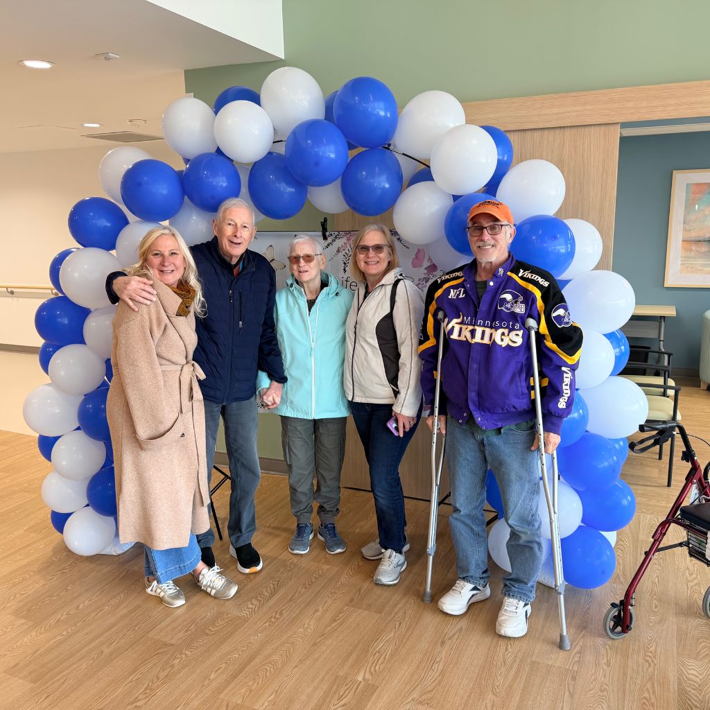 Resident with her family on move-in day.