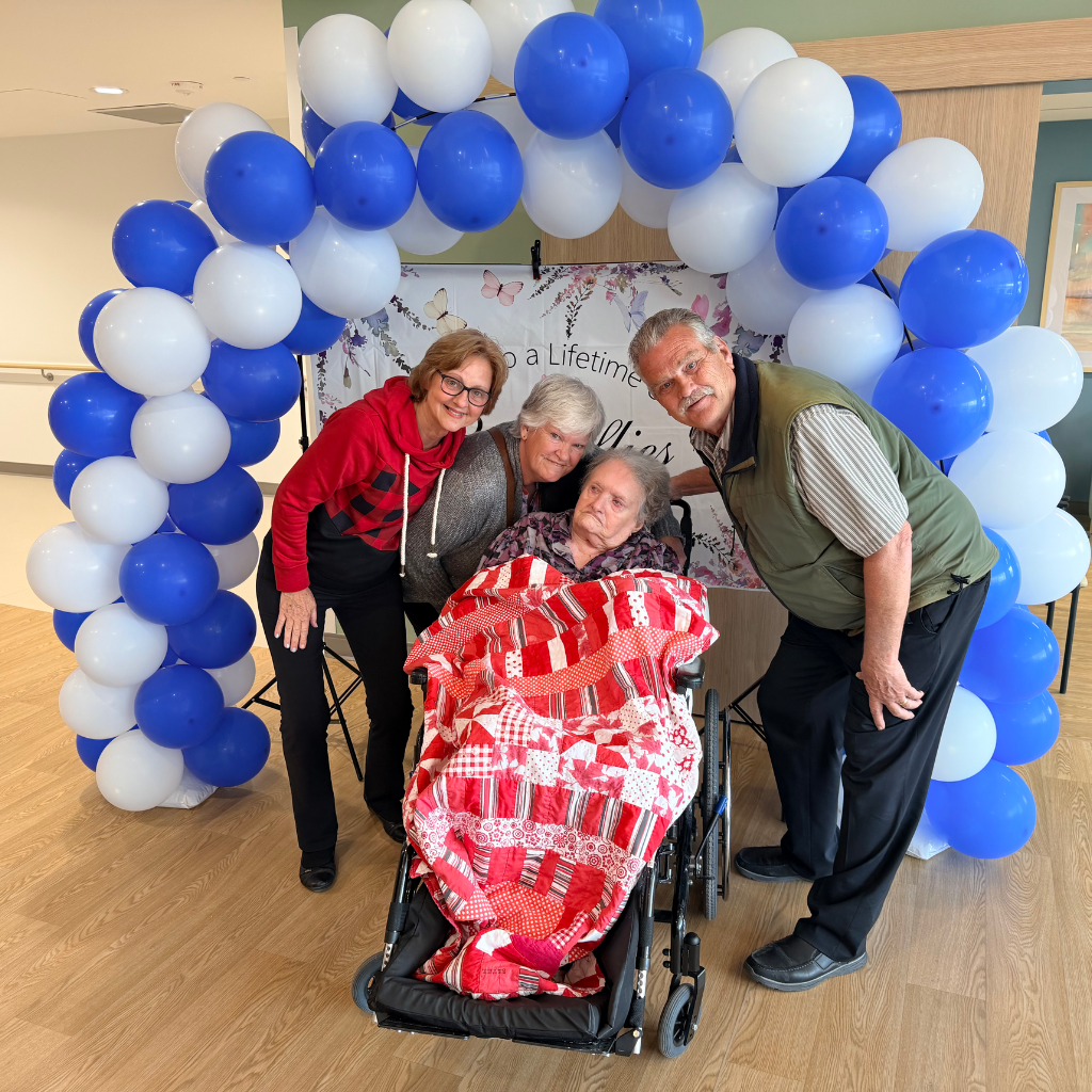 Resident with her family on move-in day.